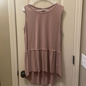Light pink women’s droptail sleeveless blouse